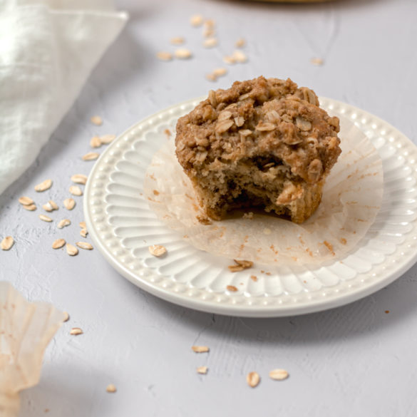 a banana nut muffin with a bite taken out