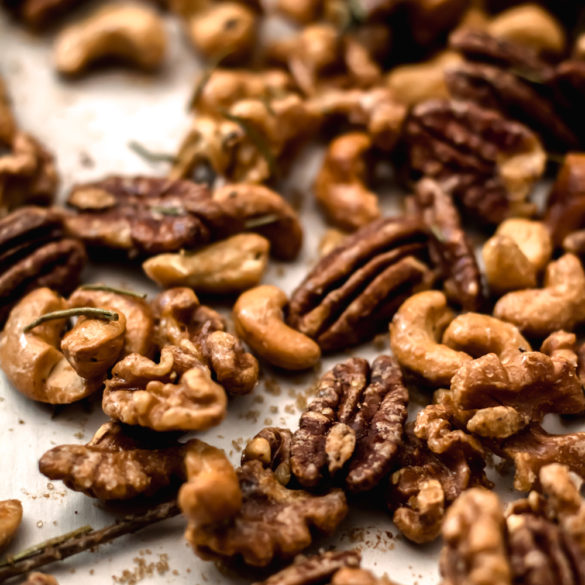 salty sweet roasted nuts on a sheet pan